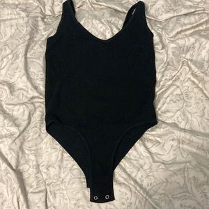 Black shirt, one piece